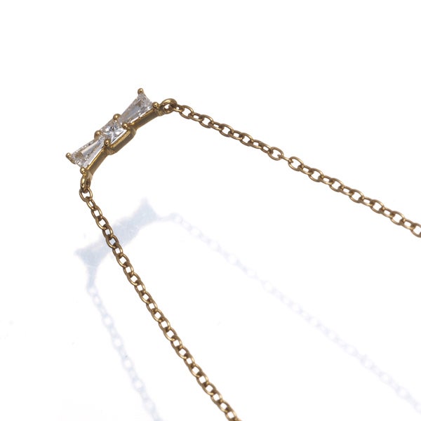 アーカー ネックレス ダイヤ 0.08ct  リボン K18YG 